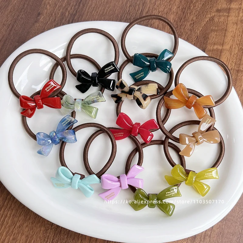 Exquisite bow tie headband ~ K - Table Tennis France recension och pris